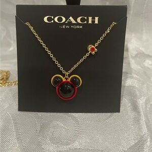 Coach Mickey Mouse Gold Necklace with Black and Red Accents. New